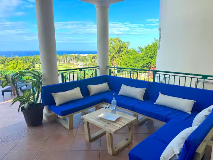 Sweet Dreams Villa patio with blue sofa and ocean views
